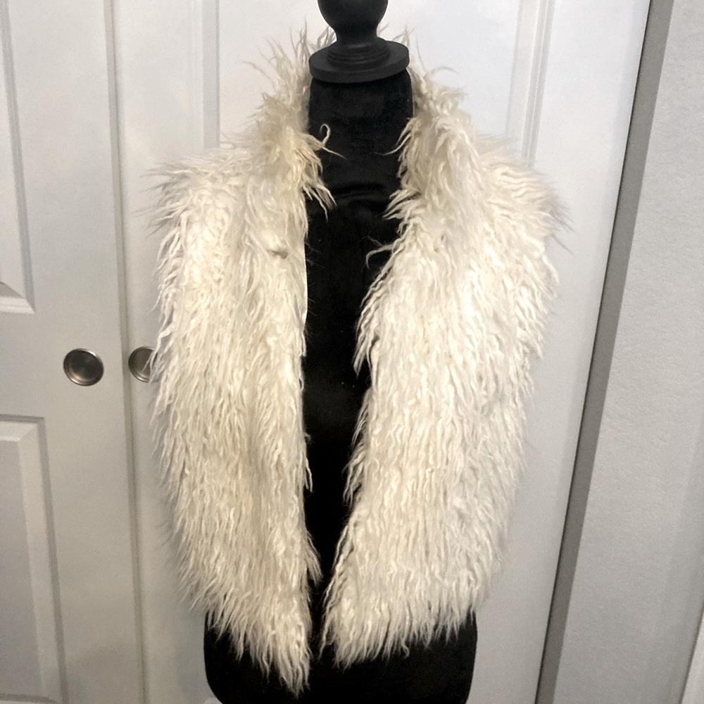 Faux fur vest. Size S . Super furry faux fur vest. Adorable with denim !!